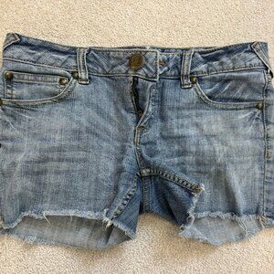 Free People distressed light wash denim cutoff shorts